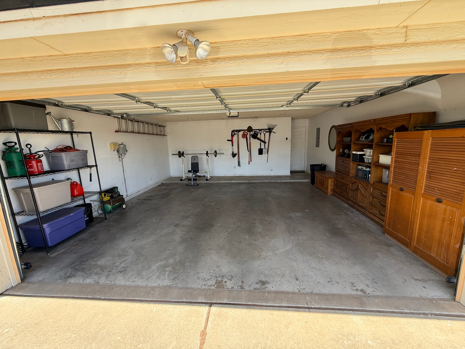 Same Lubbock garage after Timmy's Garage cleanout, cleared and organized